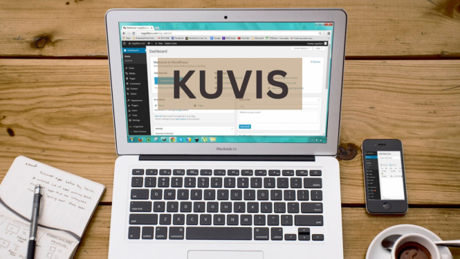 Atvērts klēpjdators. Ekrāna vidū uzraksts "KUVIS".